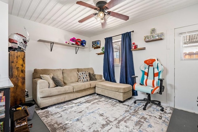 living room featuring ceiling fan