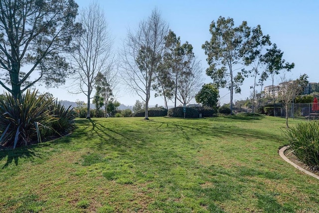 view of yard with fence