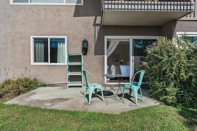 view of patio with a balcony