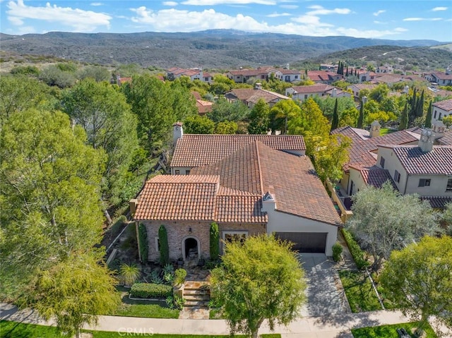 aerial view with a residential view and a mountain view