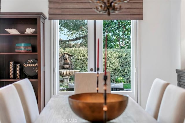 dining area with a wealth of natural light