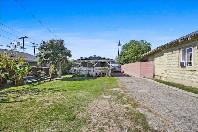 view of yard with fence