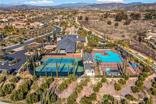 birds eye view of property with a residential view and a mountain view