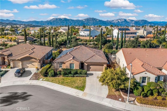 birds eye view of property featuring a residential view and a mountain view