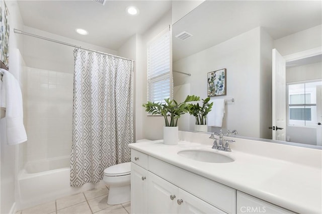 bathroom with visible vents, toilet, tile patterned flooring, vanity, and recessed lighting