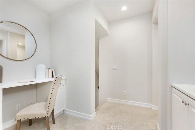 interior space featuring light carpet, recessed lighting, and baseboards