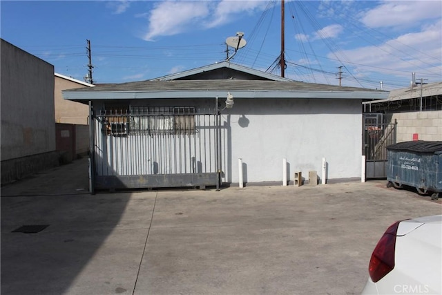 exterior space with stucco siding