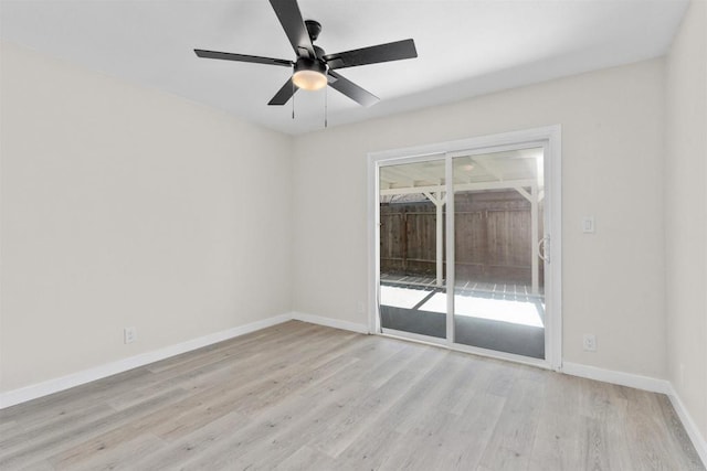 unfurnished room featuring ceiling fan, light wood finished floors, and baseboards