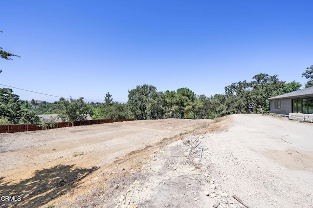 view of yard featuring fence