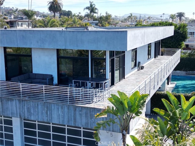 205 Esplanade, San Clemente, CA 92672 - back of property with stucco siding, an outdoor pool, and a mountain view