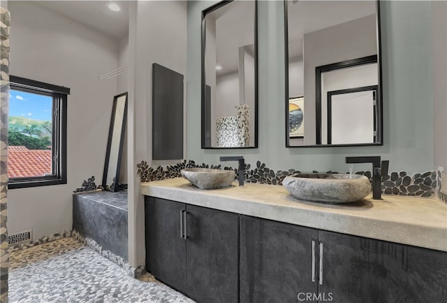 205 Esplanade, San Clemente, CA 92672 - full bathroom featuring visible vents, double vanity, and a sink