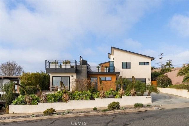 4414 Monaco St, San Diego, CA 92107 - view of front of property with a balcony and stucco siding
