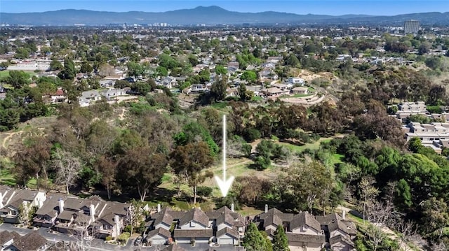 bird's eye view with a residential view and a mountain view