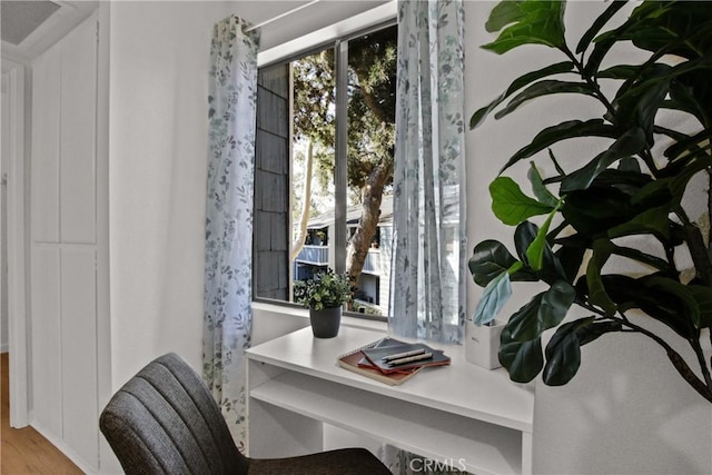 home office featuring wood finished floors