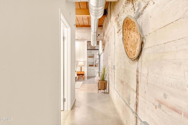 corridor with finished concrete flooring