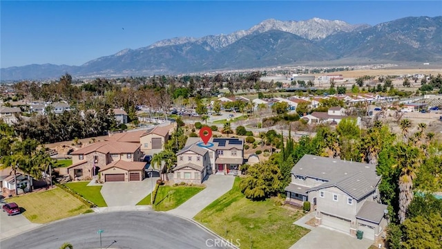 aerial view with a mountain view and a residential view