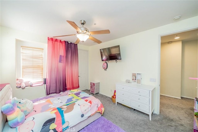 bedroom with light colored carpet and ceiling fan