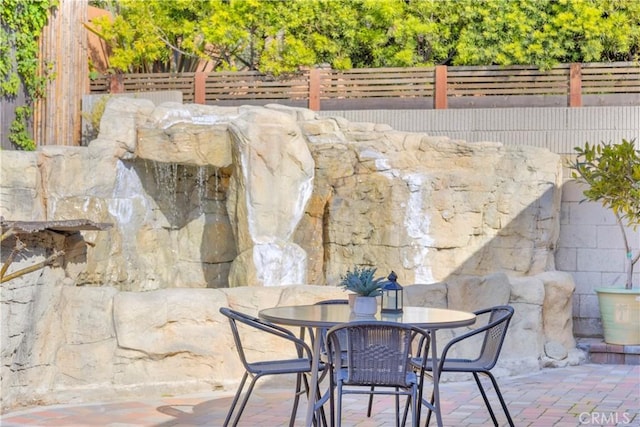 view of patio / terrace with fence and outdoor dining space