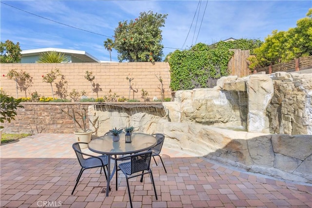 view of patio / terrace with fence