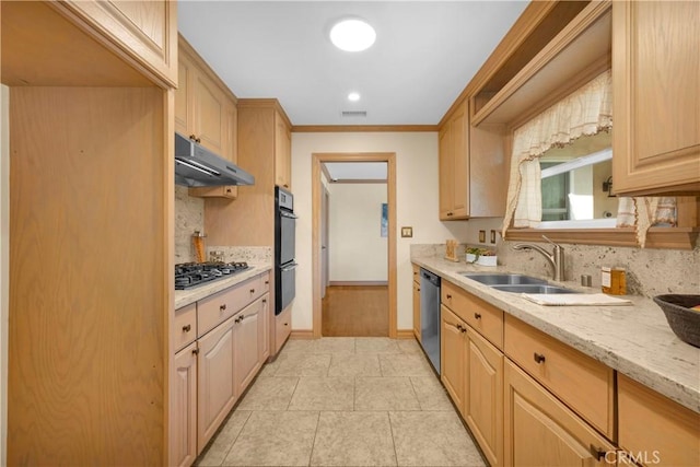 kitchen featuring visible vents, stainless steel appliances, light brown cabinetry, under cabinet range hood, and a sink