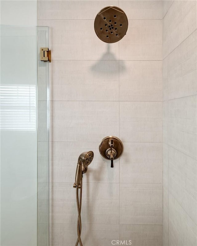 room details with a tile shower