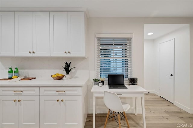 office featuring light wood finished floors and recessed lighting