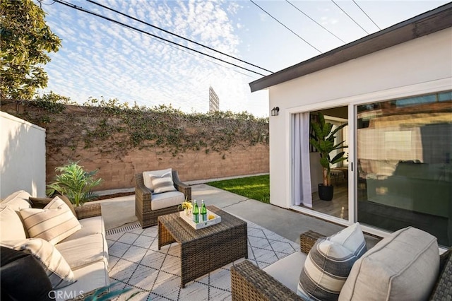 view of patio / terrace featuring a fenced backyard and outdoor lounge area