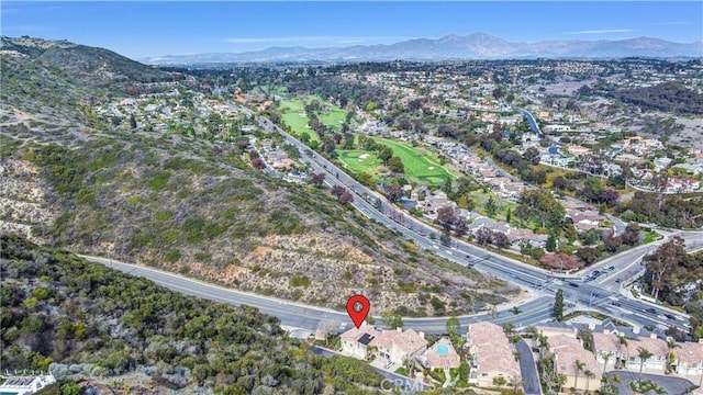 drone / aerial view featuring a mountain view