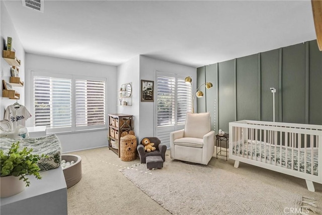 bedroom with carpet flooring and visible vents