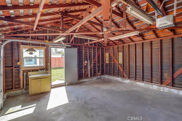 garage featuring a garage door opener