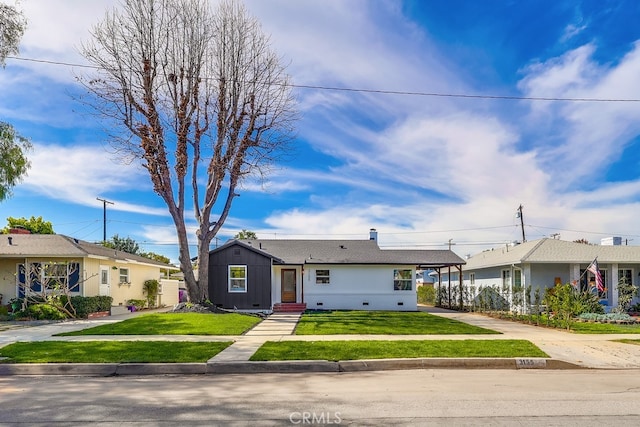 single story home featuring crawl space, driveway, and a front yard