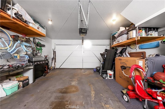 garage featuring a garage door opener