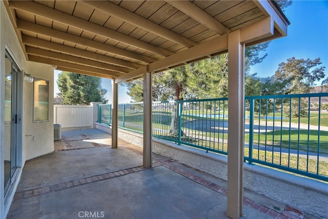 view of patio / terrace with fence and central AC unit