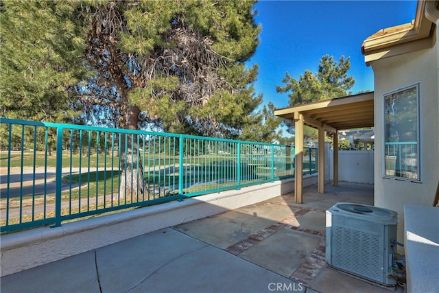 view of patio featuring fence private yard and central AC unit