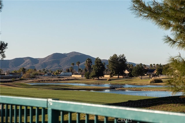 view of mountain feature with a water view