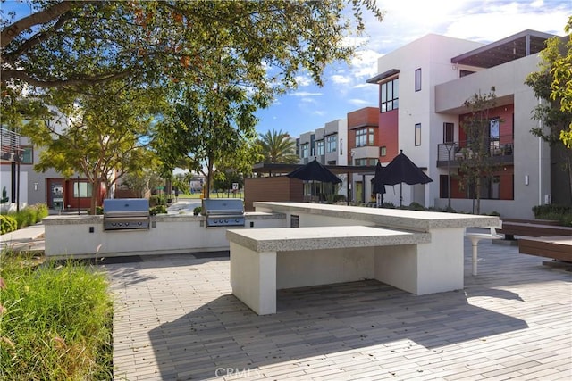 view of patio with exterior kitchen and area for grilling