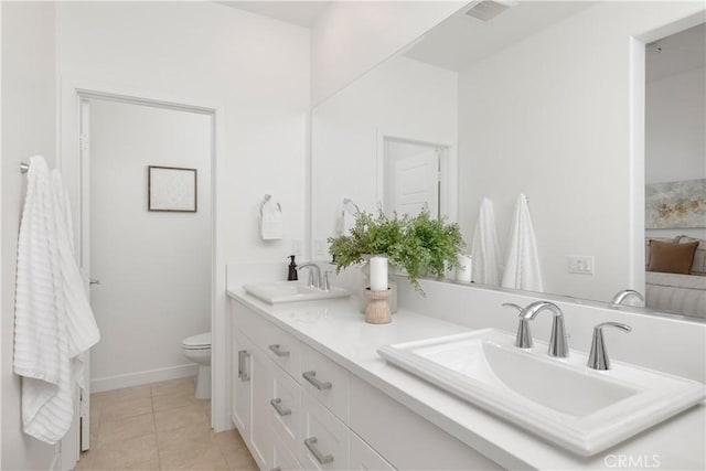 full bath featuring visible vents, a sink, toilet, and tile patterned floors