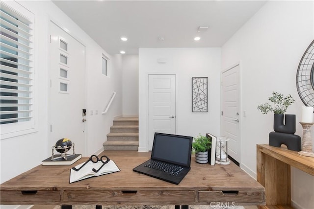 office space featuring recessed lighting, baseboards, and wood finished floors