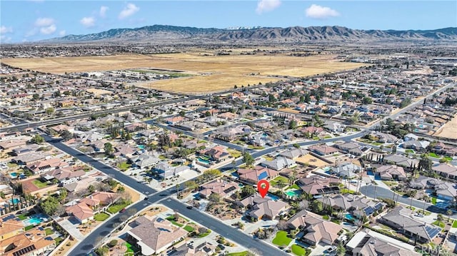 aerial view with a residential view and a mountain view