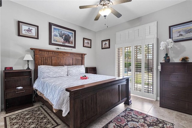 bedroom featuring access to exterior, a ceiling fan, and light tile patterned flooring