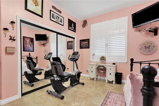 exercise area with baseboards