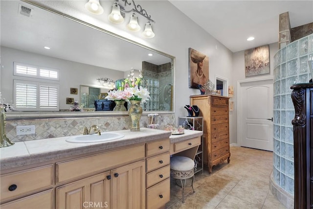 bathroom featuring tasteful backsplash, recessed lighting, visible vents, vanity, and tile patterned floors