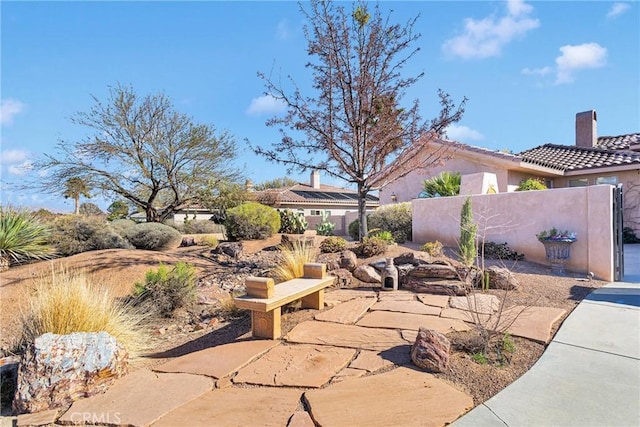 view of patio featuring fence