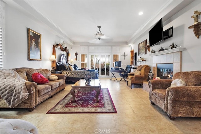 living room featuring light tile patterned floors, ornamental molding, and a fireplace