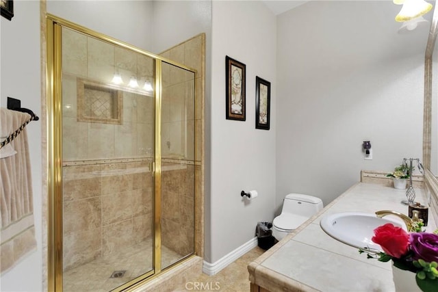 full bathroom with tile patterned flooring, toilet, vanity, baseboards, and a stall shower