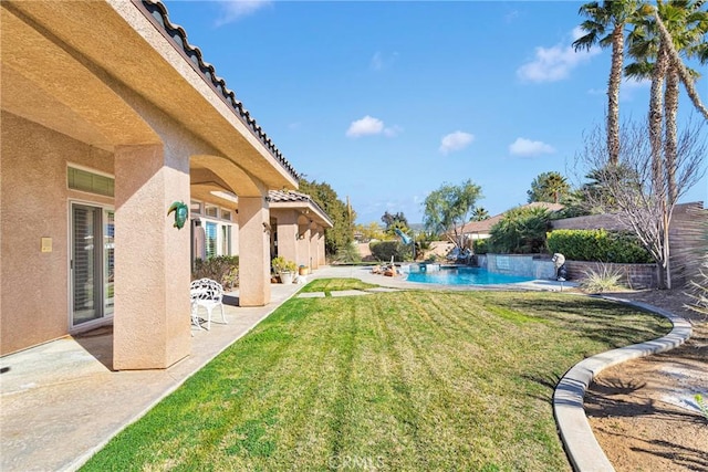 view of yard with a patio area, a fenced backyard, and a fenced in pool