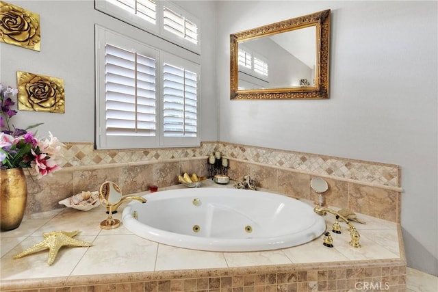 full bathroom featuring a tub with jets