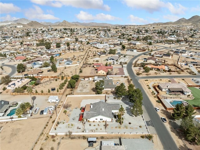 bird's eye view featuring a residential view and a mountain view