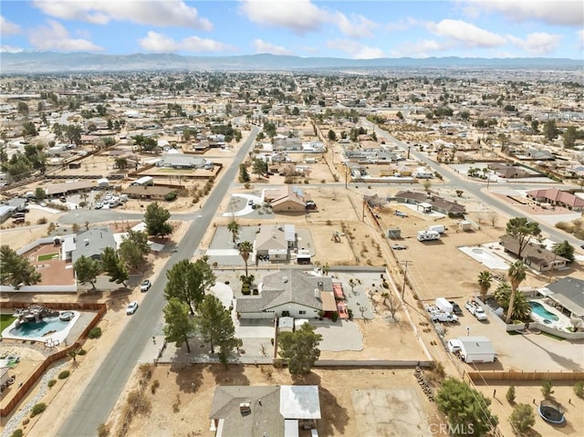 bird's eye view with a residential view and a mountain view