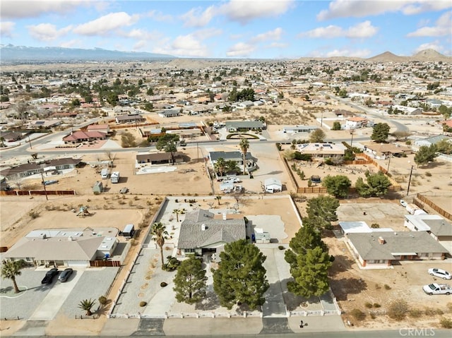 bird's eye view with a residential view and a mountain view